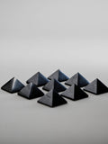 Small black shungite pyramids are great stones for protection and balance